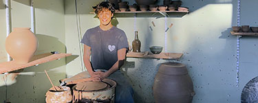 David Cuzick working in his studio